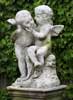 TWO CHERUBS PLAYING 21"H STATUE